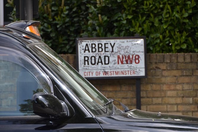 Beatles Fab 4 London Taxi Tour - Abbey Road zebra crossing and studio wall