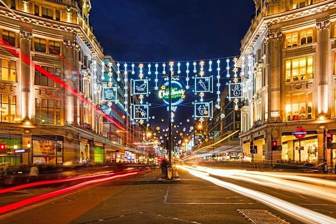 Christmas Lights Open-Top Bus Tour - Piccadilly Circus keeps the evening moving