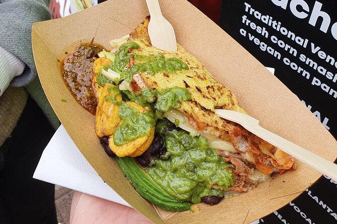 Food and Drink Walking Tours in West London's Notting Hill Area - The Notting Hill bookshop and blue door