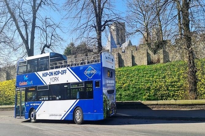 Golden Tours York Hop-on Hop-off Open Top Bus Tour with Audio Guide - The open-top view, with a weather warning