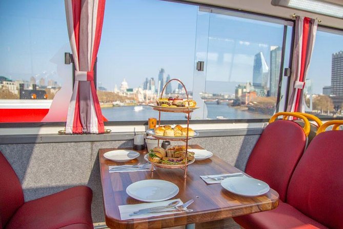 London Afternoon Tea Bus with Panoramic Tour - Buckingham Palace from a moving bus