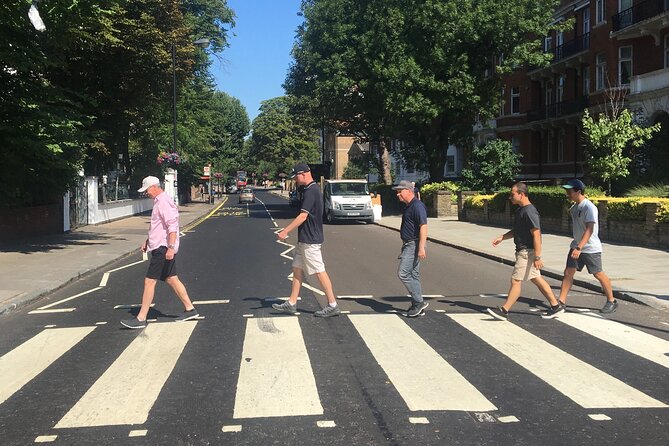 London Beatles Tour - Piccadilly Circus and the Beatles on stage