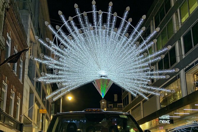 London Bespoke Black Cab Christmas Lights & Sights Private Tour - Covent Garden closes with lights and market stalls