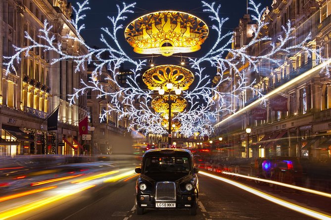 London by Night Bus Tour with Christmas Lights and Live Guide - The Strand and the glowing fairy display