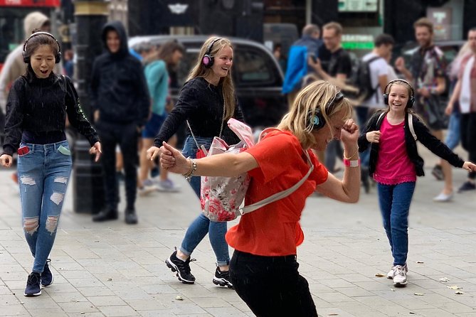 London West End Musical Silent Disco Walking Tour Top 1% Rated - The Noel Coward Theatre and a moving stage