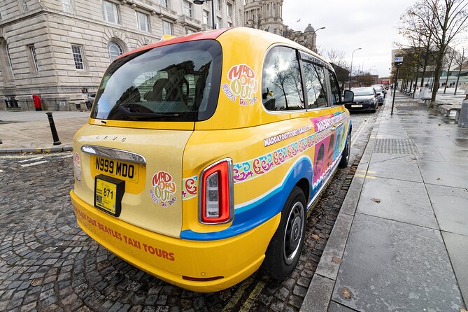 Mad Day Out Beatles Taxi Tours in Liverpool, England - Penny Lane, seen as a real neighborhood