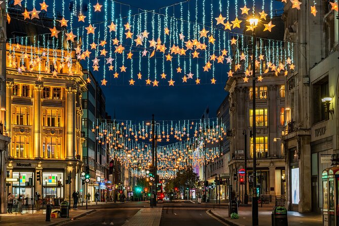 Magical London Christmas Lights Walking Tour with a Londoner - Piccadilly Circus under the digital lights