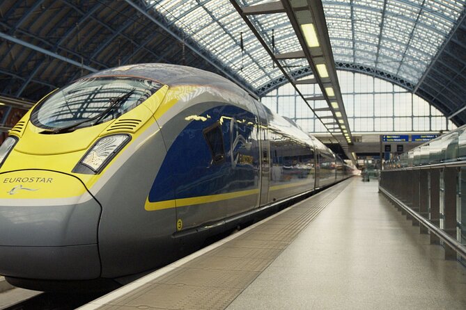 Paris by Rail with Sightseeing Bus and River Seine Lunch Cruise - Eiffel Tower photo stop: fifteen minutes, no more