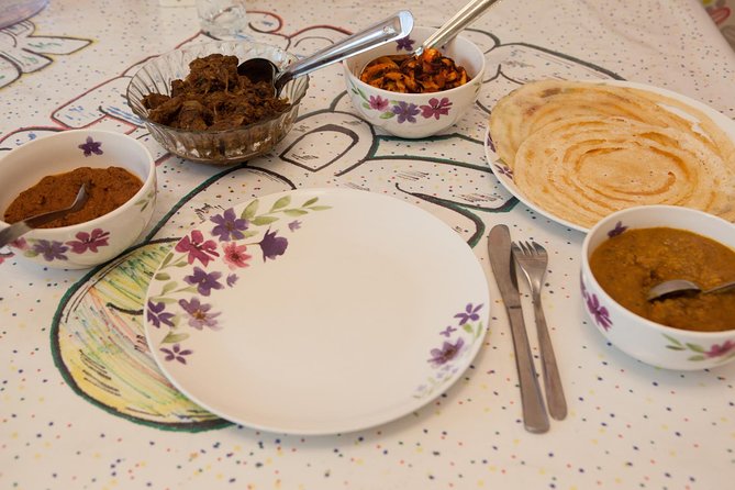 Private South Indian Home Cooking Class in London with a Local - Sitting down to the meal you helped make