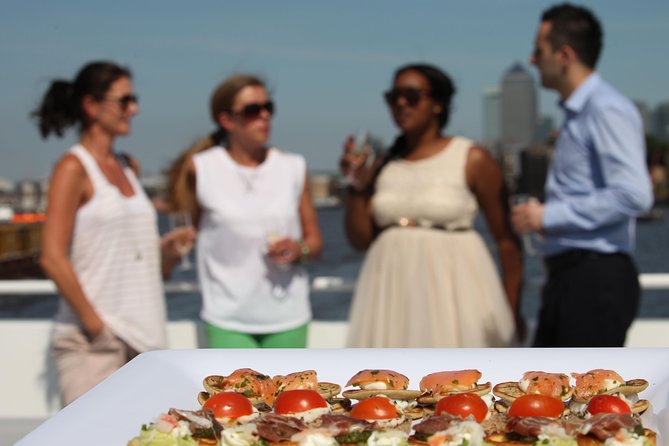 River Thames Evening Cruise with Sparkling wine and Canapés - The Shard and HMS Belfast from the water
