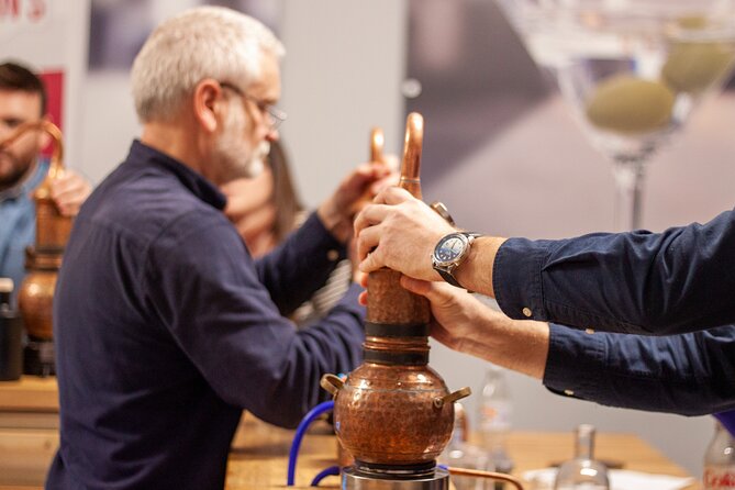 Shared Gin, Vodka & Rum Making Experience at Nelson's Distillery - Wax sealing and labeling your 70cl bottle